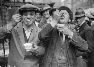Ardboe men eating eels after a charge of drink